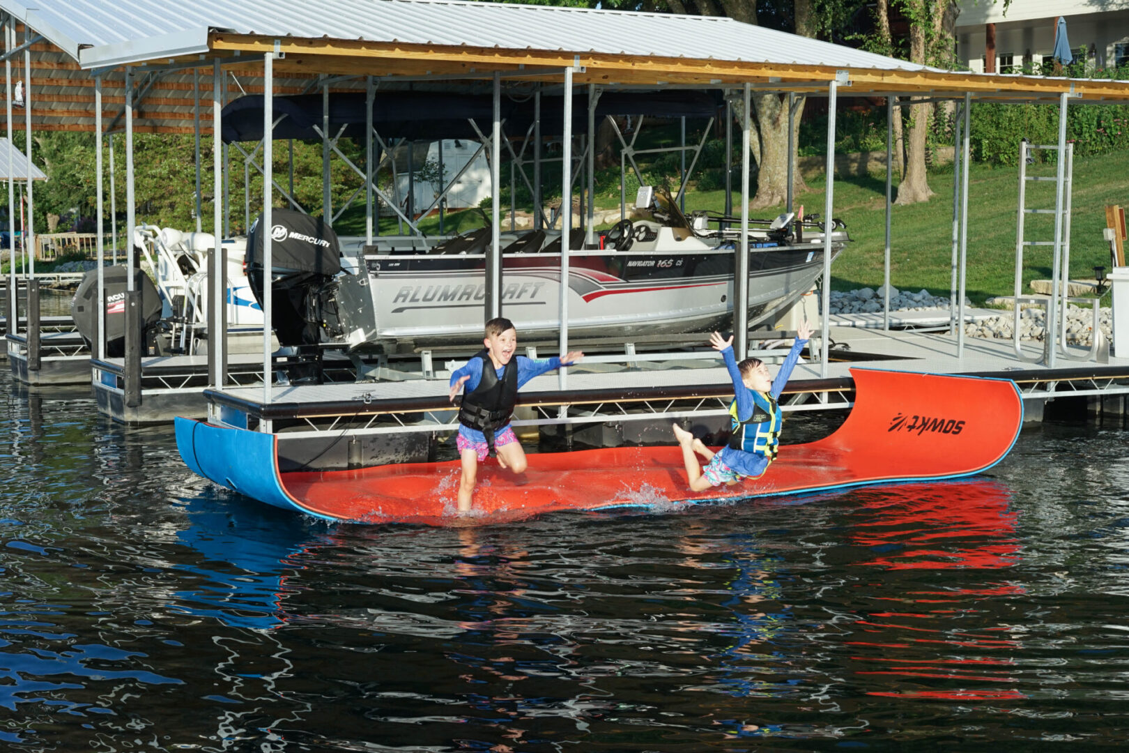 Two people in a boat on the water.