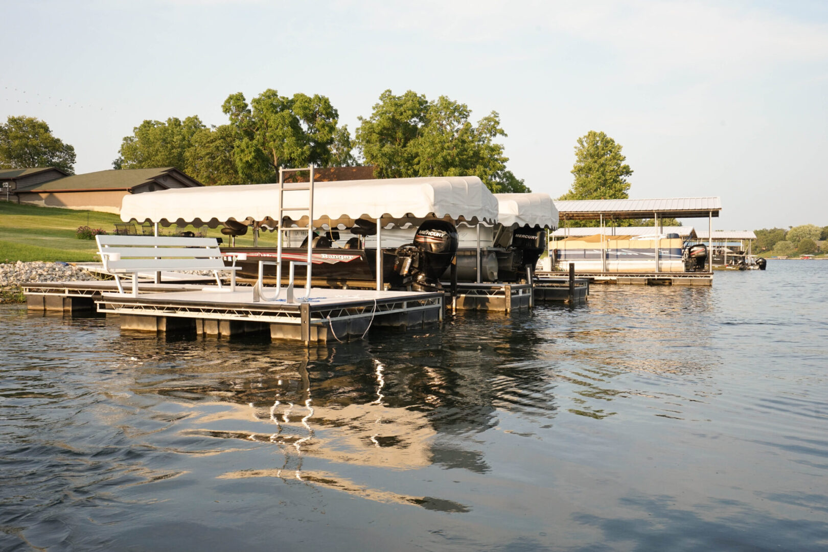 A dock with several boats in the water.