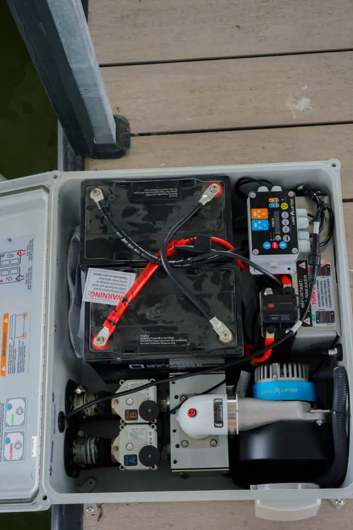 Boat lift control box with batteries.
