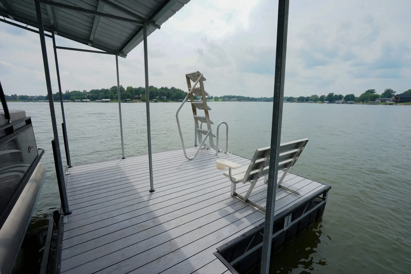 Lake dock with bench and swim ladder.